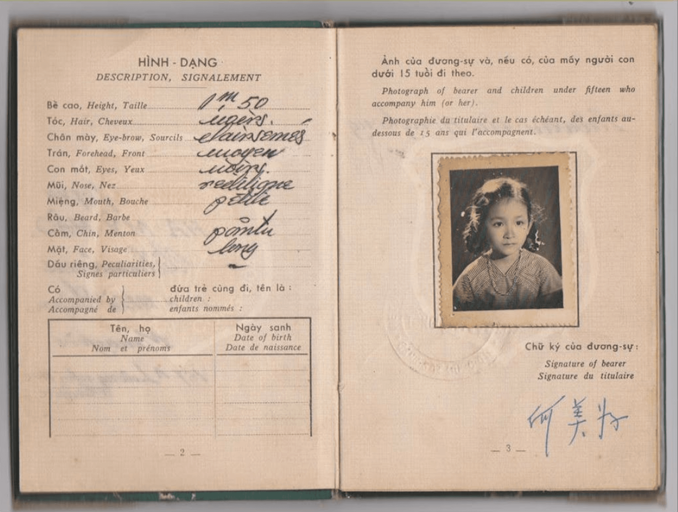 Old family photograph with worn, rounded edges
